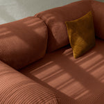 Primyhome brown corduroy convertible sofa bed fabric close-up with soft natural light shadows